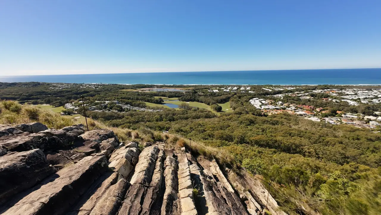 The coastline and towns stretching north from the rocky summit of Mount Coolum