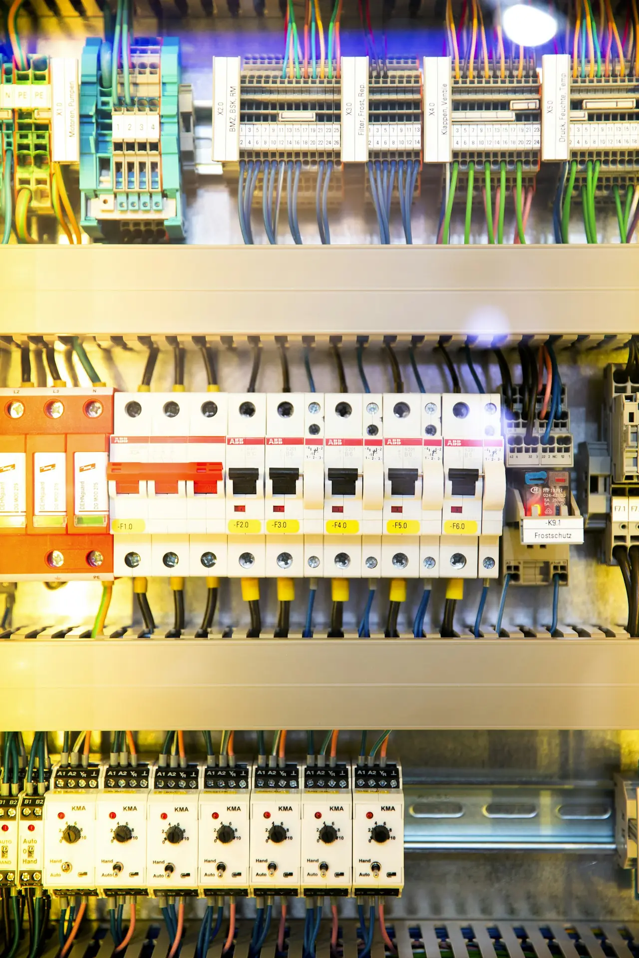 Rows of circuit breakers and safety switches in a switchboard