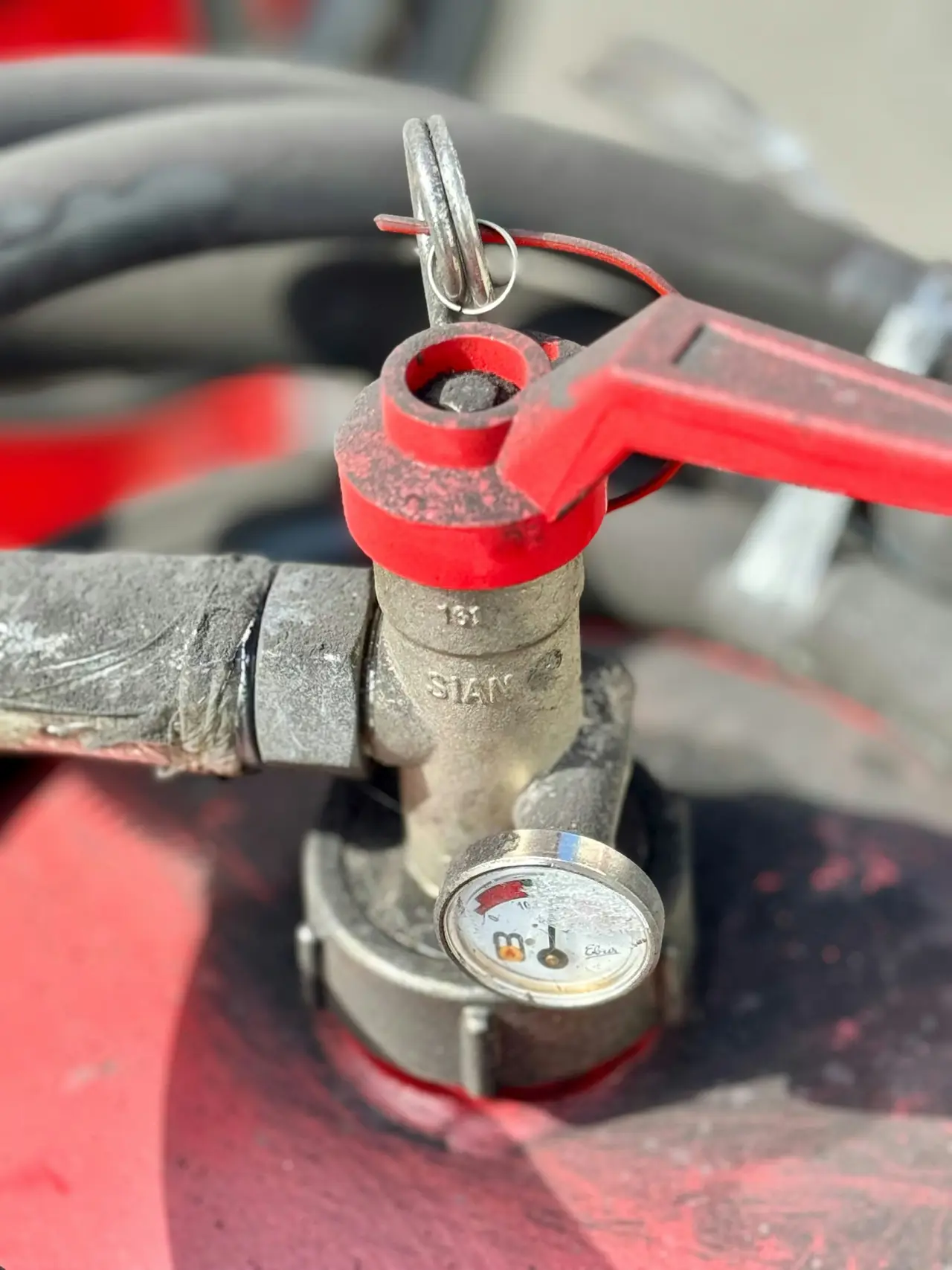 A gas regulator and pressure gauge